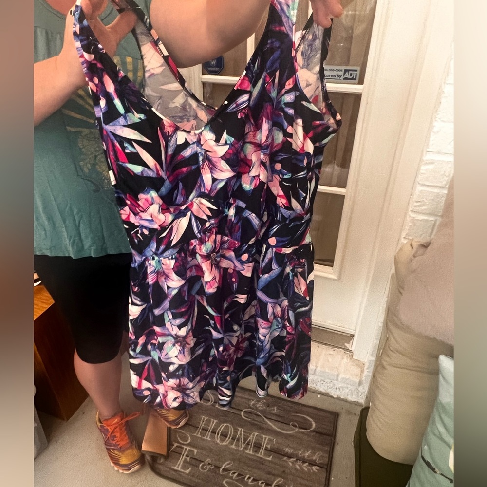 25% off listed price. Plus size one piece swimsuit